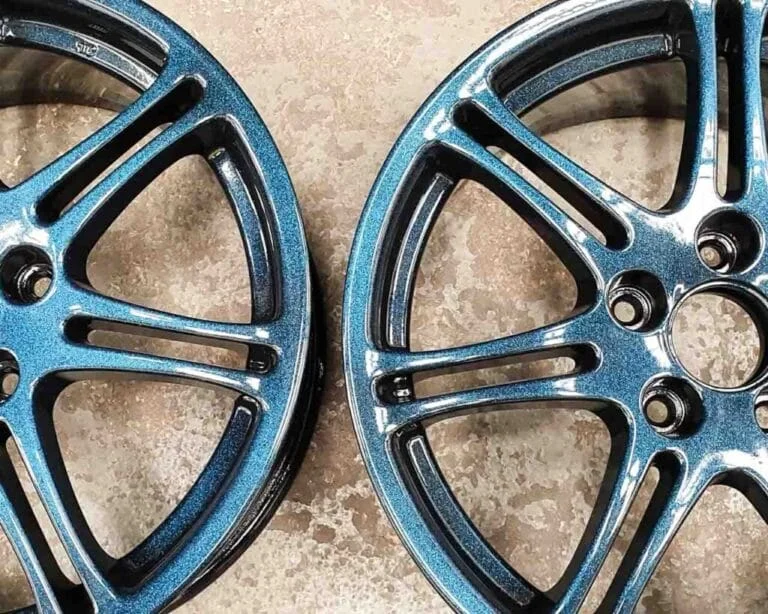 Custom turquoise alloy wheel refurbishment — powder coated finish
